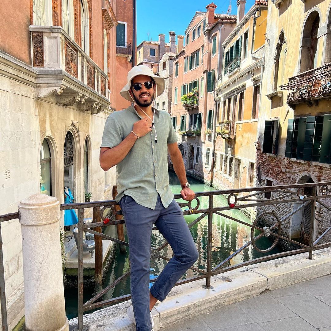 Jamie Pinheiro on a bridge in Venice, Italy