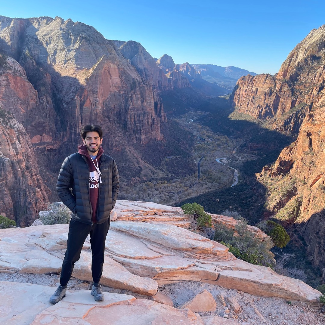 Jamie Pinheiro on ledge in Zion National Park